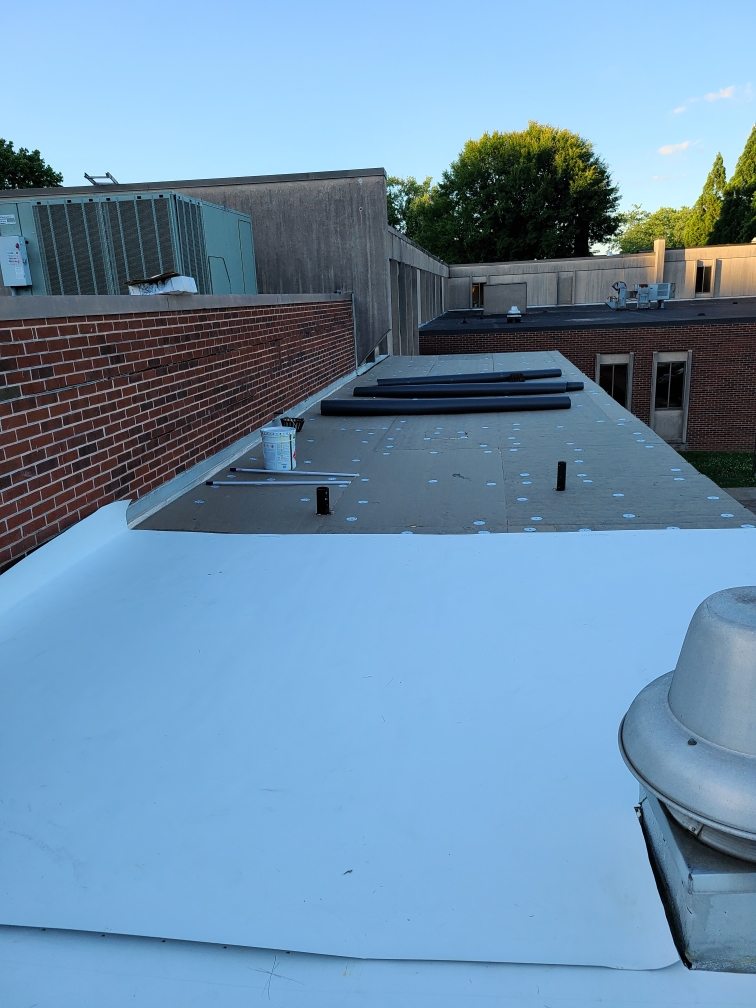 Commercial flat roof membrane work in progress