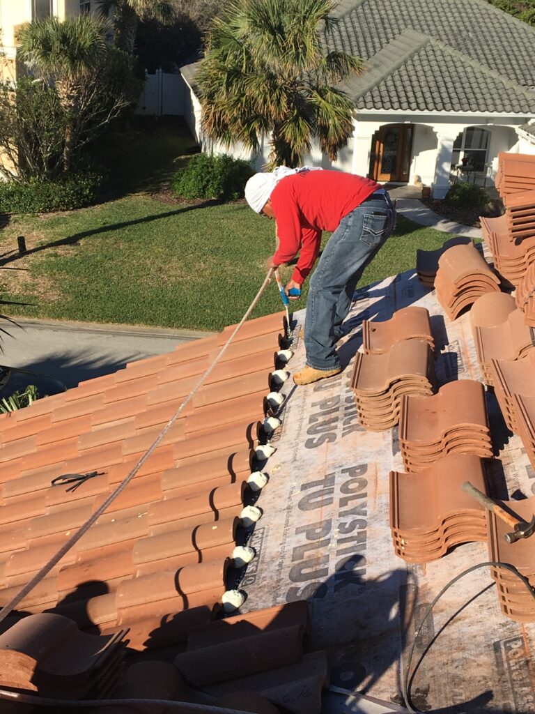 Realistic clay tile roof installation in progress